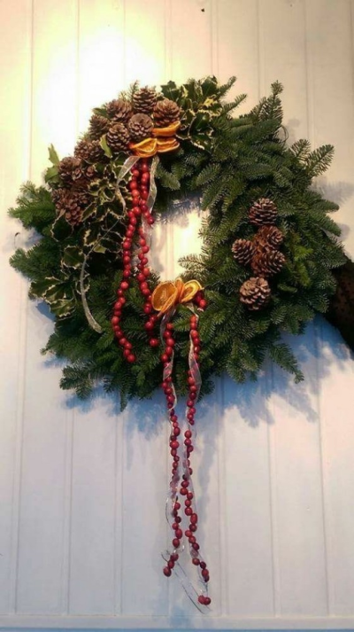 Handmade Christmas wreath - Get into the festive season with a traditional, handmade Christmas door wreath for your front door.

**ORDERS NOW BEING TAKEN**

Emma has created the 'Fine & Dandy' Christmas collection for when something truly stunning, beautiful and unique is required!

All orders are freshly prepared by our team of highly skilled, professional florists in the shop on Lisle Avenue in Kidderminster ready for collection or delivery.

Final arrangement may look different to the image and stems may be substituted when necessary but your arrangement will always look stunning! The container is subject to availability and may be substituted.

Almost what you're after? We can tailor any bouquet to your needs and budget. Want to incorporate their favourite colours? Do you want to adapt the style to your needs and budget? All colours, styles and budgets can all be catered for.

Arrangements are available for same day delivery, when ordered before 2pm, in Kidderminster and the surrounding area. (Charges apply)