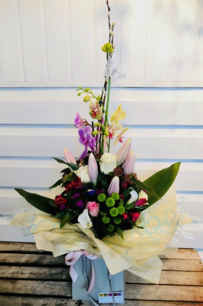 Phalenopsis Dream - A colourful and structured bouquet of pink Lilies, Moth Orchids (Phalenopsis), white Roses and green Chrysanthemums with pussy willow and lush dark green leaves for Mother's Day.

Each bouquet is designed and created by professional, qualified, local florists, Emma and her team. The talented florists at Flowers of Kidderminster add a touch of pizazz and style to every bouquet, which is put together by hand, from scratch.

Almost what you're after? We can tailor any bouquet to your needs and budget. Want to incorporate their favourite colours? Do you want to adapt the style to your needs and budget? All colours, styles and budgets can all be catered for.

All flowers are subject to availability. Substitutes may be used but your bouquet will always look beautiful!