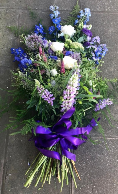 Natural Wild Hand Tie Tribute - Sympathy flowers are a beautiful way to let someone know that you are thinking of them at a sad time.

This wild flower hand-tied bouquet in purple, lilac and white is designed and created by professional, qualified, local florists, Emma and her team. The talented florists at Flowers of Kidderminster add a touch of style to every bouquet, which is put together by hand, from scratch.

Almost what you're after? We can tailor any bouquet to your needs and budget. Want to incorporate their favourite colours? Do you want to adapt the style to your needs and budget? All colours, styles and budgets can all be catered for.

All flowers are subject to availability. Substitutes may be used but your bouquet will always look beautiful!

Order by 2pm for same day delivery. Also available to order for a day of your choice.
