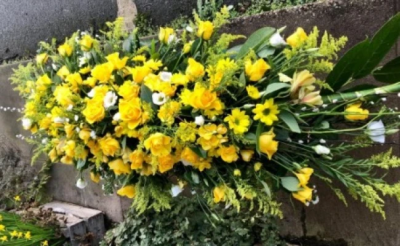 Yellow Double-ended Coffin Spray - This all yellow, double-ended coffin spray is made up in the florists' selection of yellow stems including Roses and Carnations against green foliage and is available in 3 different lengths; 4ft, 5ft or 6ft.

Funeral Tributes which reflect the personality and the life of the person sadly departed are created with care and attention by our team of qualified, professional and local florists.

Express condolences and pay tribute with this spray, expertly prepared by professional, locally based, florists Emma and Laura. At this difficult time, Emma and her team are here to help make choosing and ordering funeral flowers and sympathy tributes a little easier.

All arrangements are created from our collection of fresh flowers at our shop in Lisle Avenue, Kidderminster.

Almost what you're after? We tailor all funeral tributes to your specific requirements. We can incorporate their favourite colours or create a style that reflects their personality. Come in and talk to us about what you would like and we will create it for you.

All flowers are subject to availability. Substitutes may be used but your tribute will always look beautiful!

Funeral Tributes can be delivered on the day to a location of your choice.