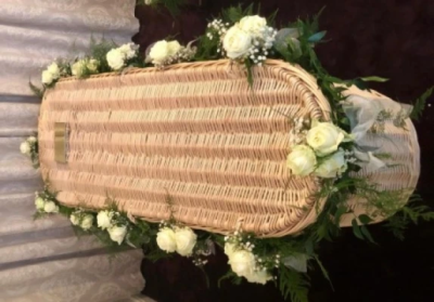 Rose Coffin Garland - This beautiful rose coffin garland is made with cream roses, gypsophila set with green foliage.

Funeral Tributes which reflect the personality and the life of the person sadly departed are created with care and attention by our team of qualified, professional and local florists.

Express condolences and pay tribute with this spray, expertly prepared by professional, locally based, florists Emma and Laura. At this difficult time, Emma and her team are here to help make choosing and ordering funeral flowers and sympathy tributes a little easier.

All arrangements are created from our collection of fresh flowers at our shop in Lisle Avenue, Kidderminster. 

Almost what you're after? We tailor all funeral tributes to your specific requirements. We can incorporate their favourite colours or create a style that reflects their personality. Come in and talk to us about what you would like and we will create it for you.

All flowers are subject to availability. Substitutes may be used but your tribute will always look beautiful!

Funeral Tributes can be delivered on the day to a location of your choice.